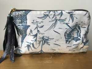 EVA TASSELED POUCH CLUTCH TRAVEL BAG